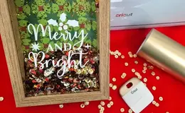 a frame with glitter in it