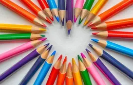a heart made of colored pencils