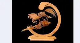 a wooden sculpture of a horse
