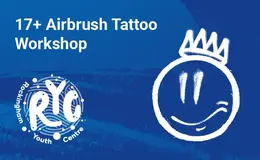 Round smiling emoji style face with a crown on a blue background