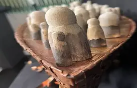 a wooden figures on a boat