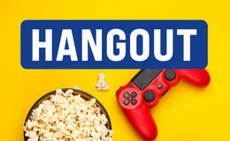 a bowl of popcorn and a game controller