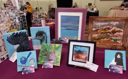a table with paintings on it