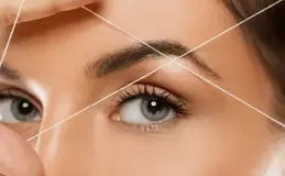 a close up of a woman's eye