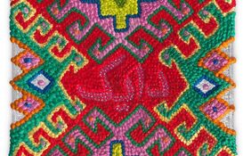 a colorful rug with a pattern