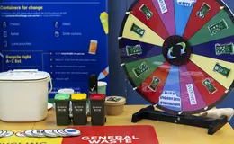 a wheel of garbage on a table