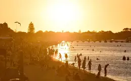 Crowds of people at Rockingham Foreshore at sunset