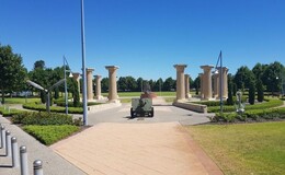 a large stone structure with a cannon in the middle
