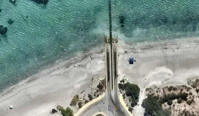 Aerial photo of Port Kennedy Boat Launching Facility showing the boat ramp and adjacent beach area where sand excavation works will take place.