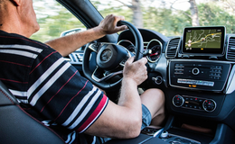a man driving a car