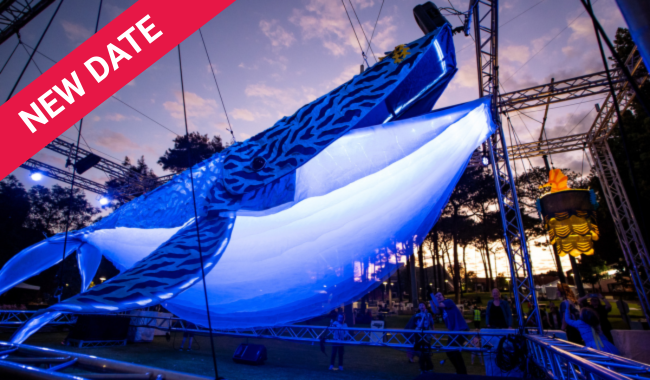 a blue whale shaped object with a white stripe