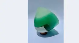 a green and white object