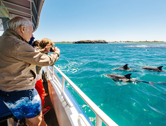 Senior on a dolphin cruise