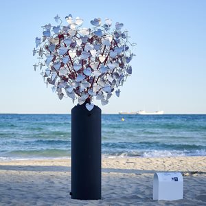 A metal sculpture shaped like a heart made from bed mattress, aluminium seconds, recycled wire, metal on Rockingham Foreshore